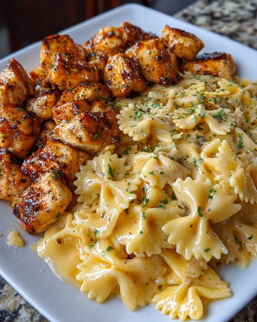 Mozzarella Garlic Butter Chicken Bowties in Cheesy Cream Recipe - Recipe Image
